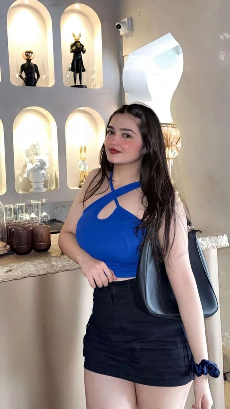 Mature high-class escort in evening gown for discreet hotel dinner date